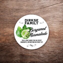 Customizable bergamot label featuring watercolor bergamot graphics on a white background with black text. This photo shows a round label. All text on the label is customizable.