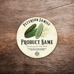 Customizable pickle label featuring cucumber and dill graphics on a vintage paper background. This photo shows a round label. All text on the label is customizable.