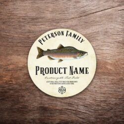 Customizable salmon label featuring an illustration of a Coho salmon on a vintage paper background. The label in this photo shows a round label. All text on the label is customizable.