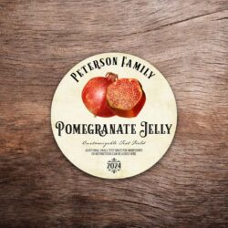 Customizable pomegranate label featuring pomegranate graphics on a vintage paper background. The label in this photo shows a round label. All text on the label is customizable.